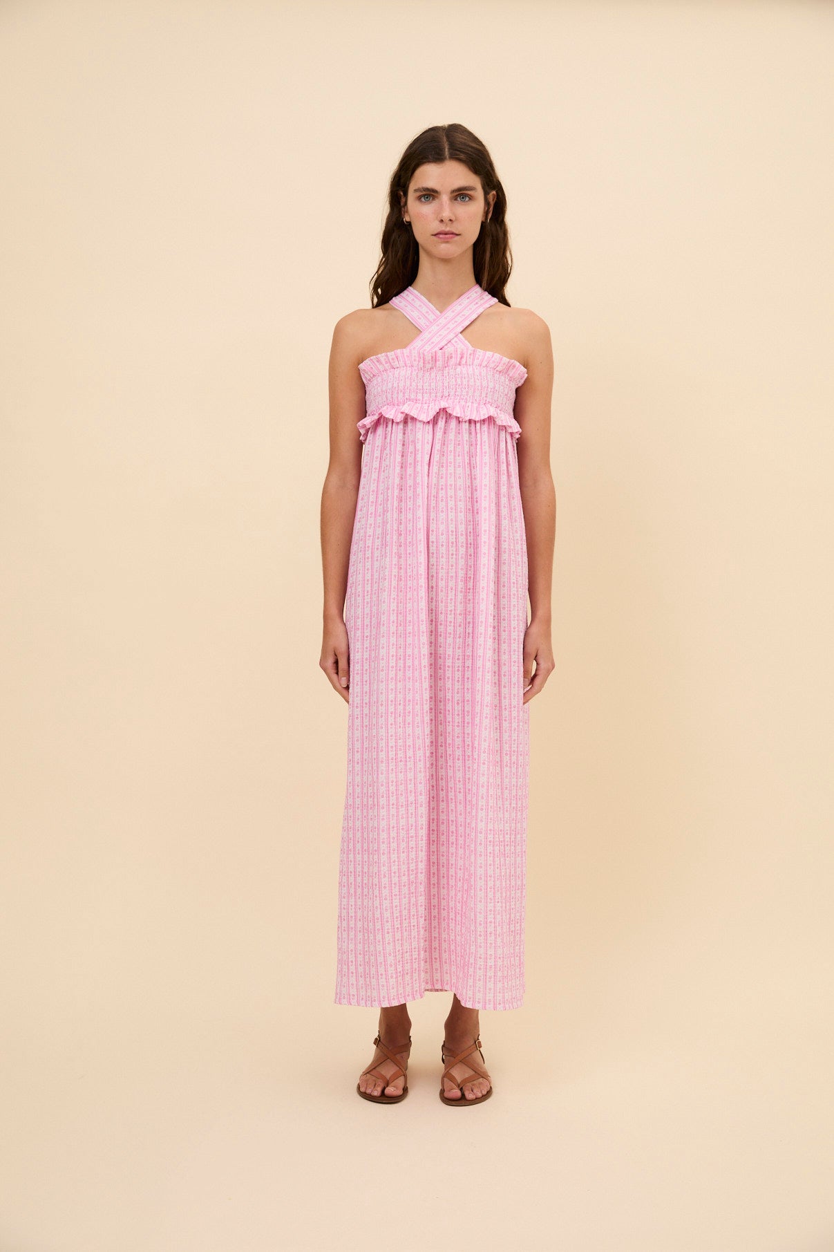 Woman Bares crossed dress