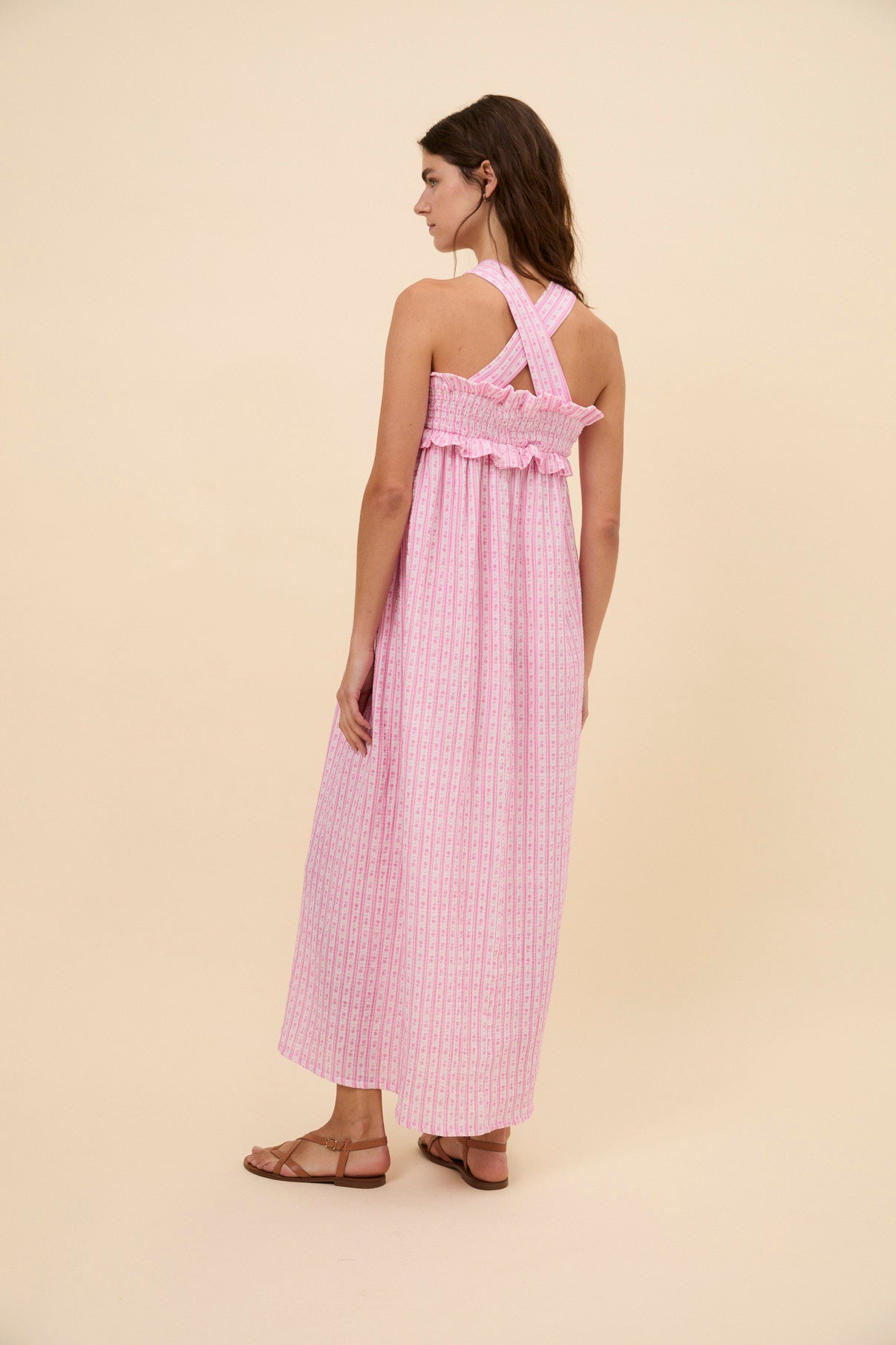 Woman Bares crossed dress