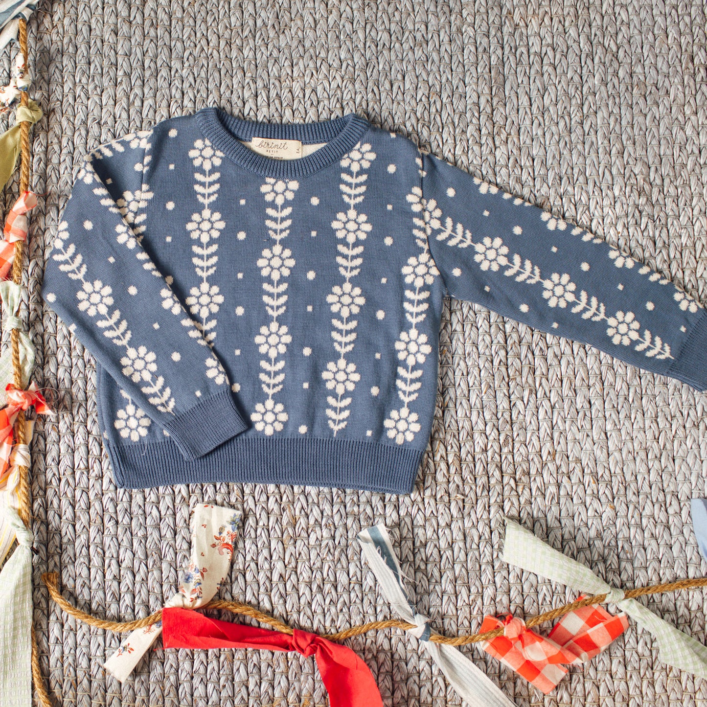 Grecas green and coral sweater