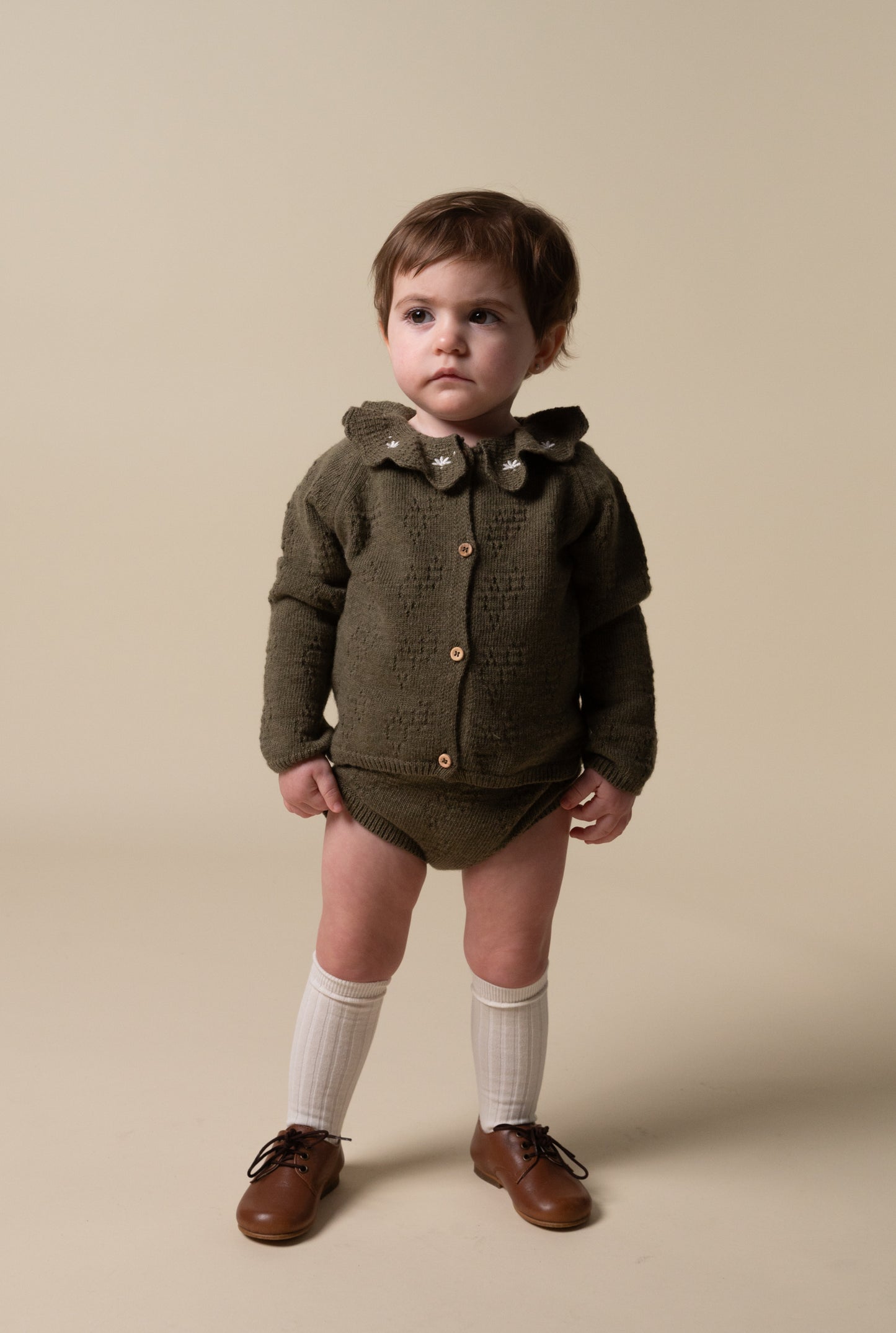 Green knit bloomer baby