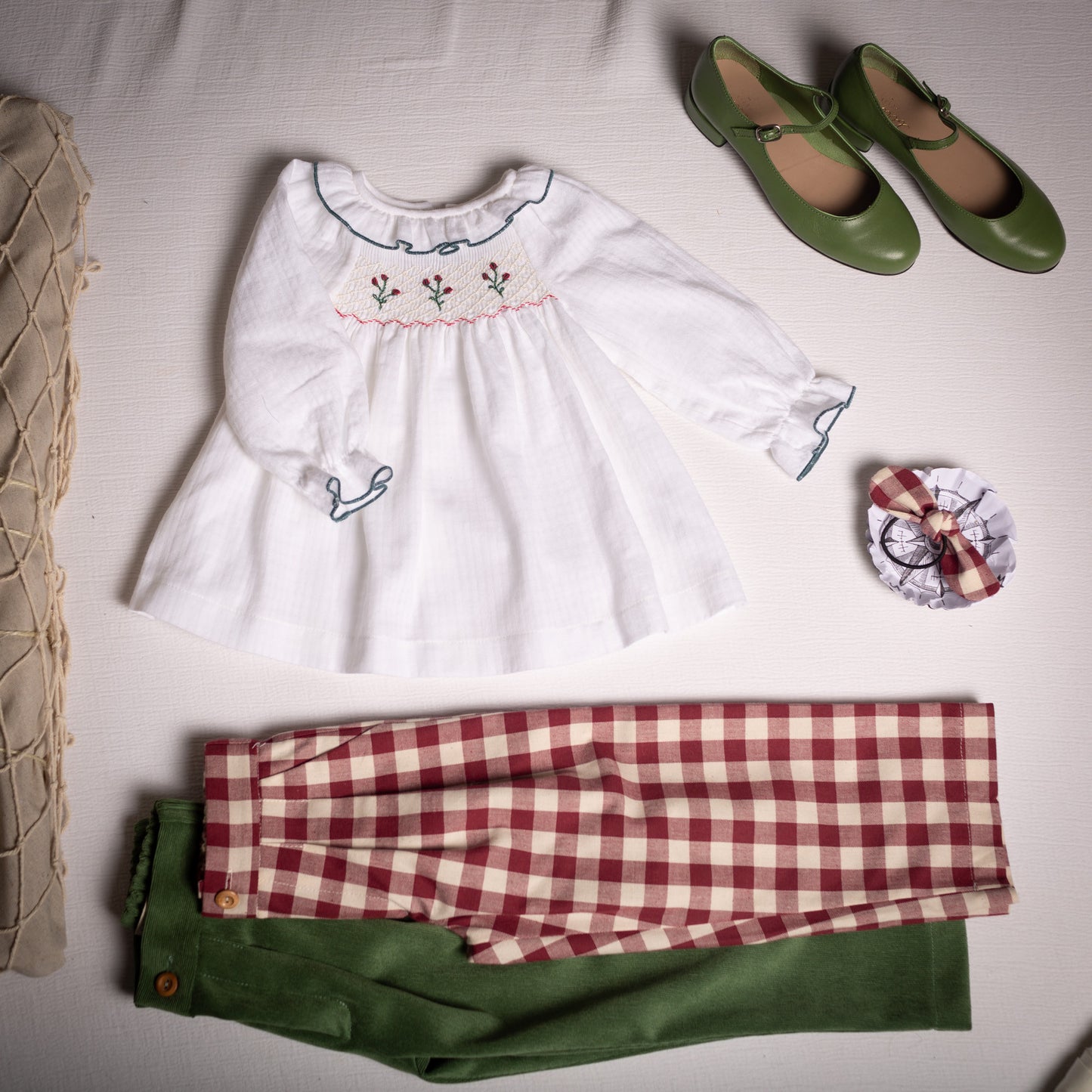 White embroidered smocked blouse