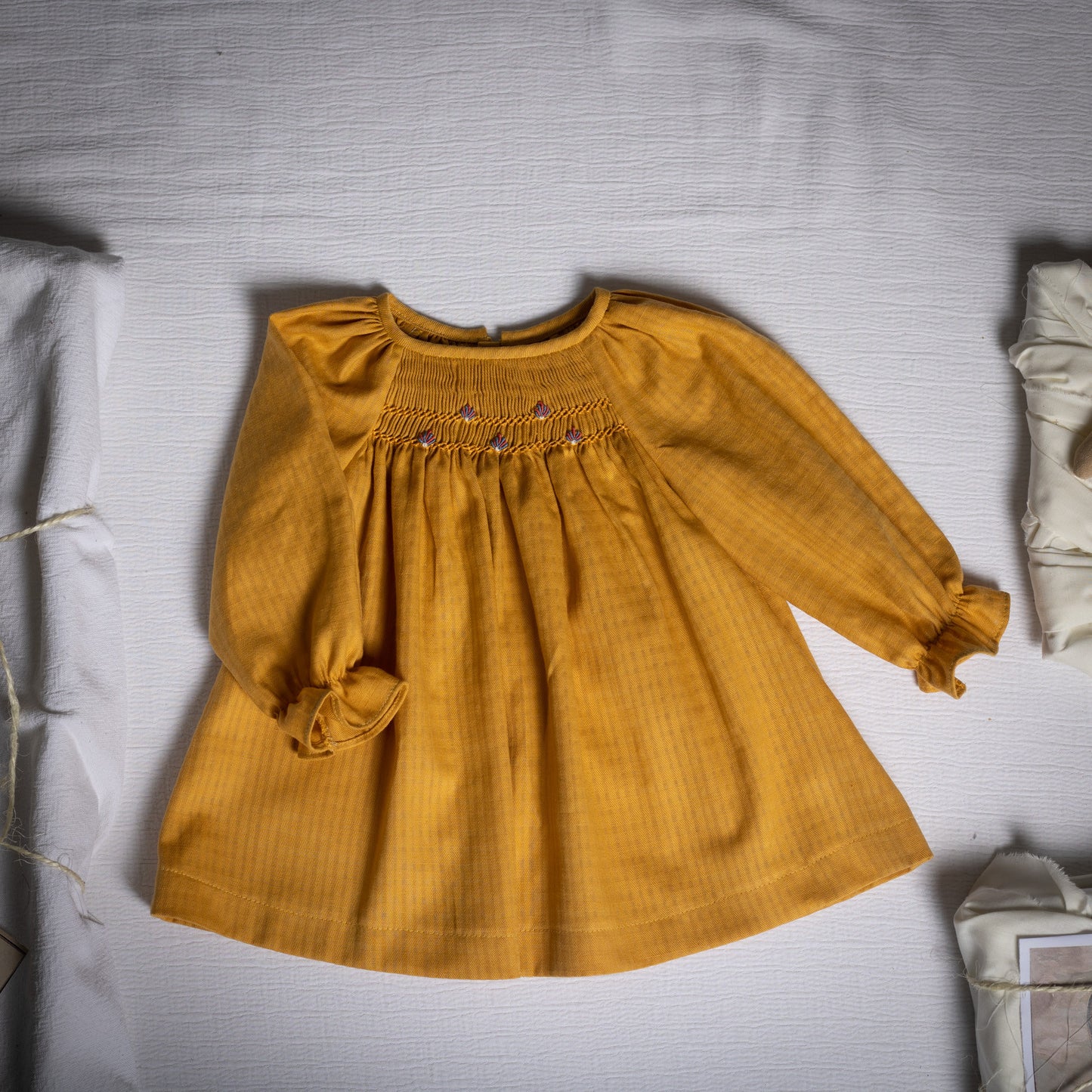 Mustard embroidered smocked blouse