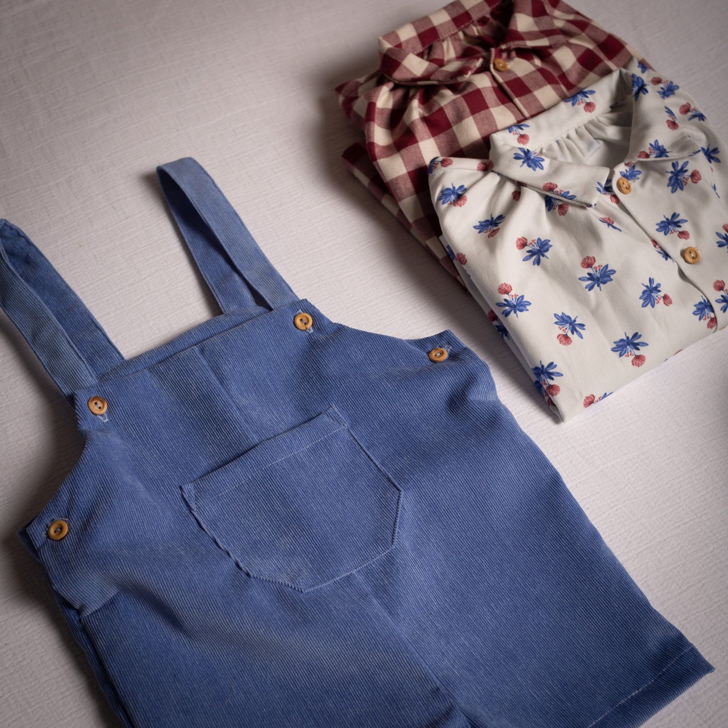 Bluish corduroy short overall