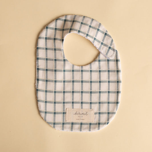 Greenish plaid bib