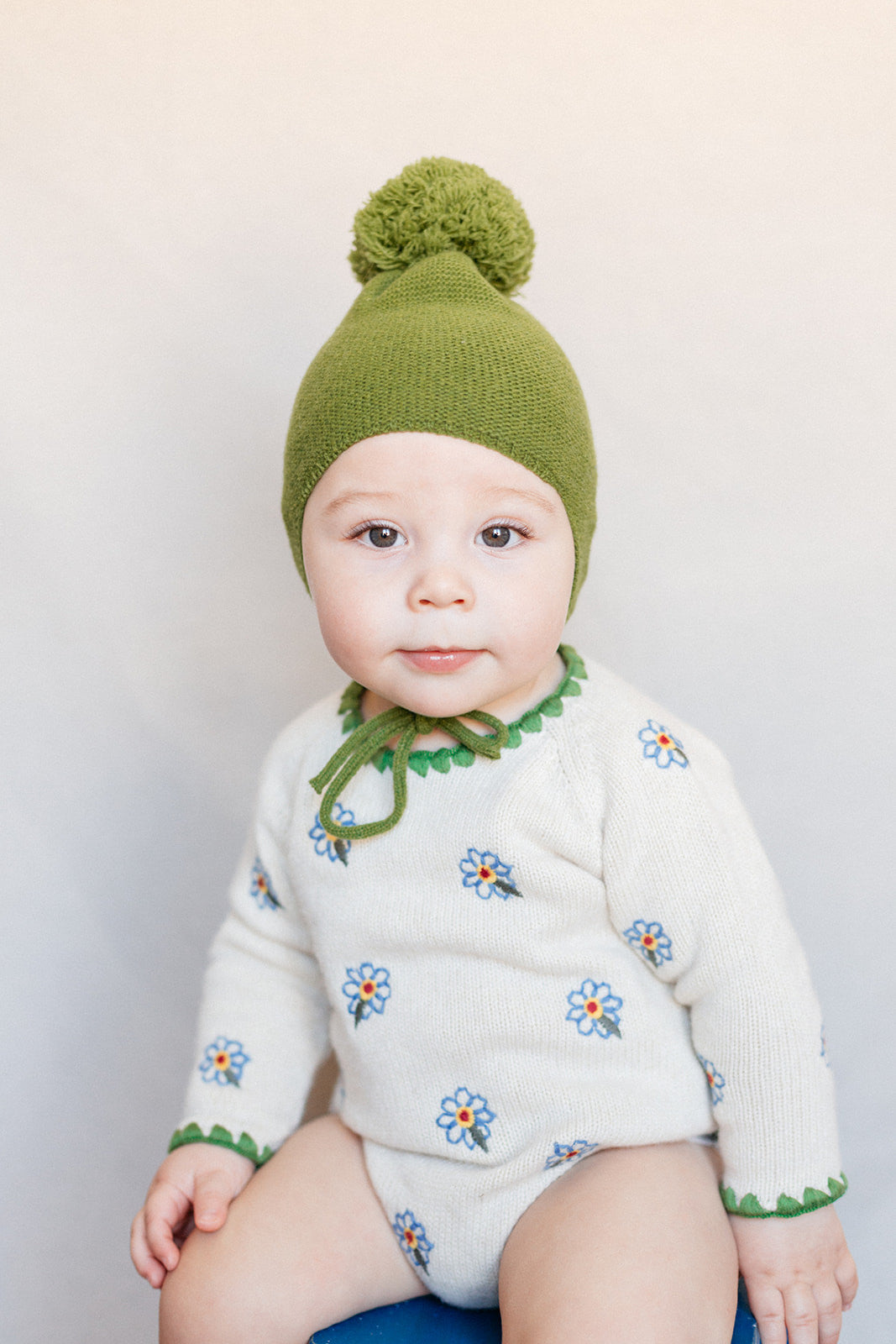 Green pompom bonnet