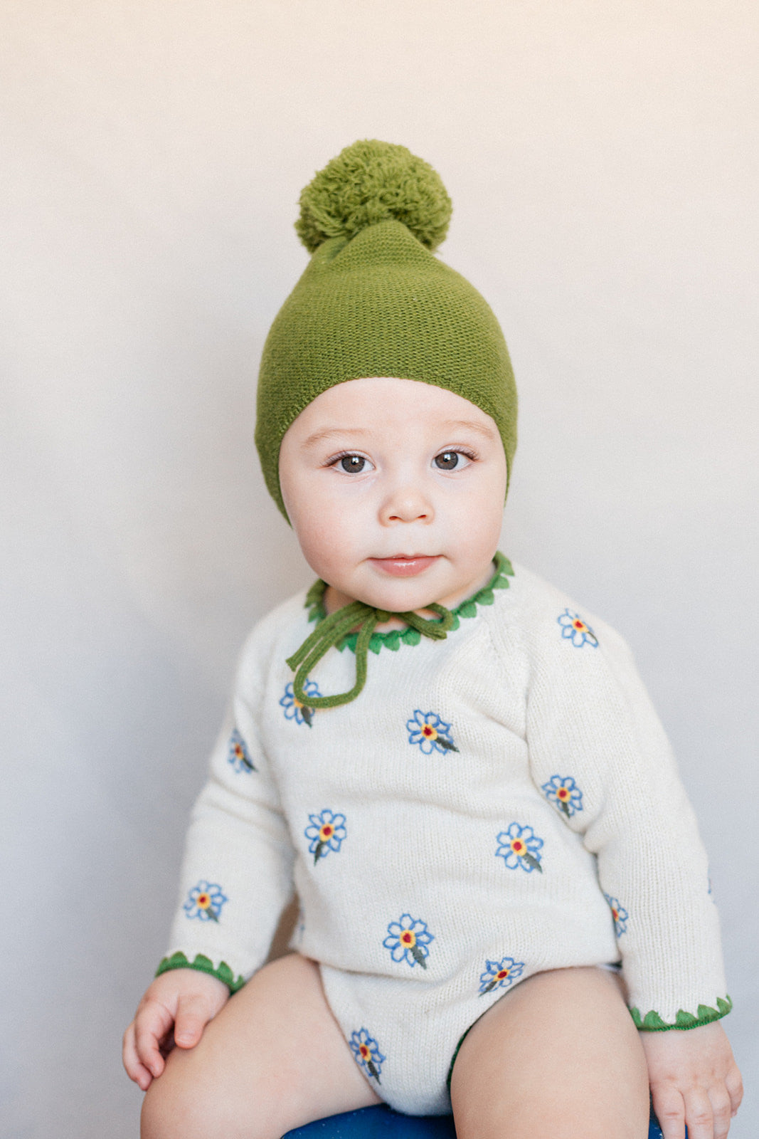 Green pompom bonnet