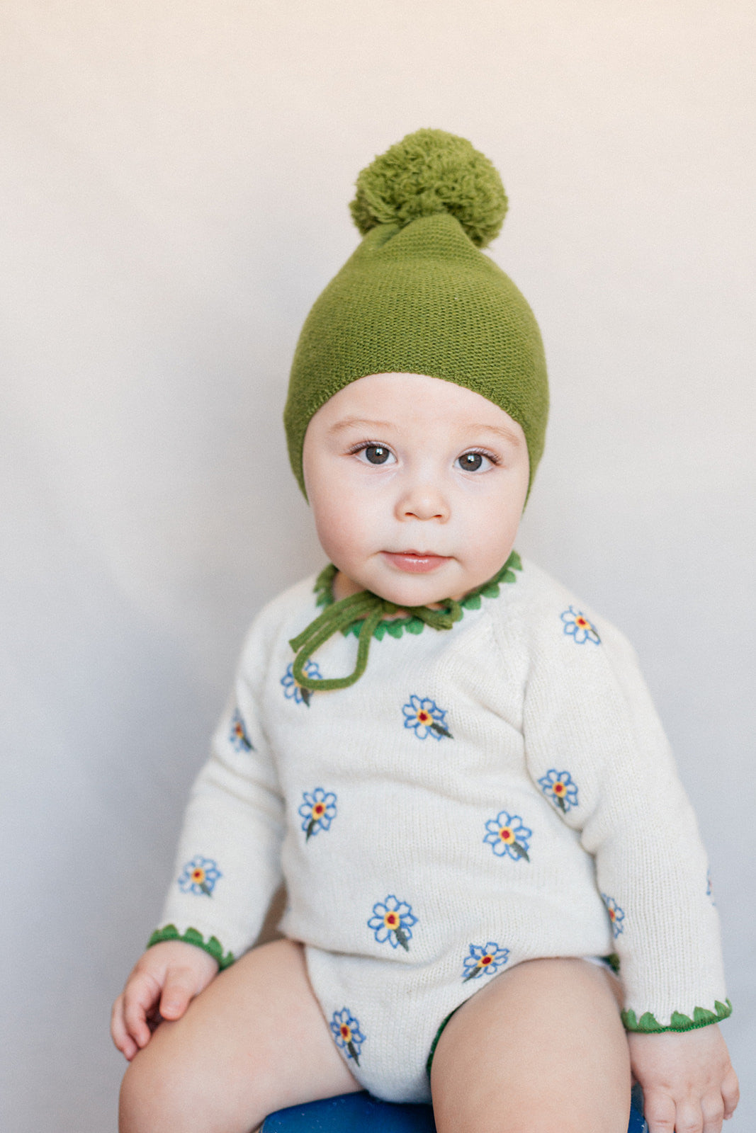 Green pompom bonnet