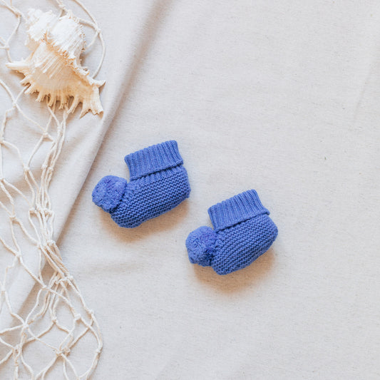 Bluish pompom booties