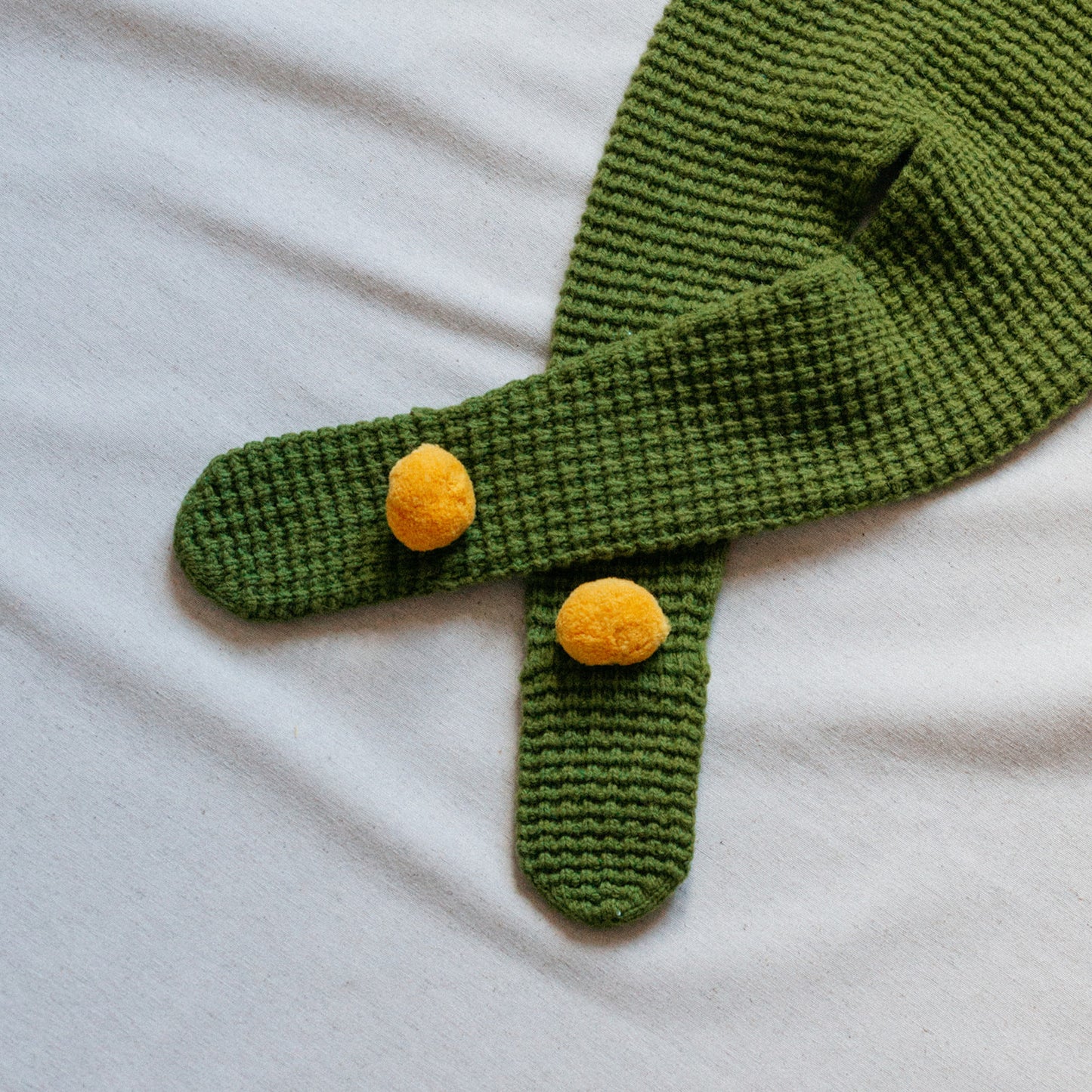 Green pompom gaiter