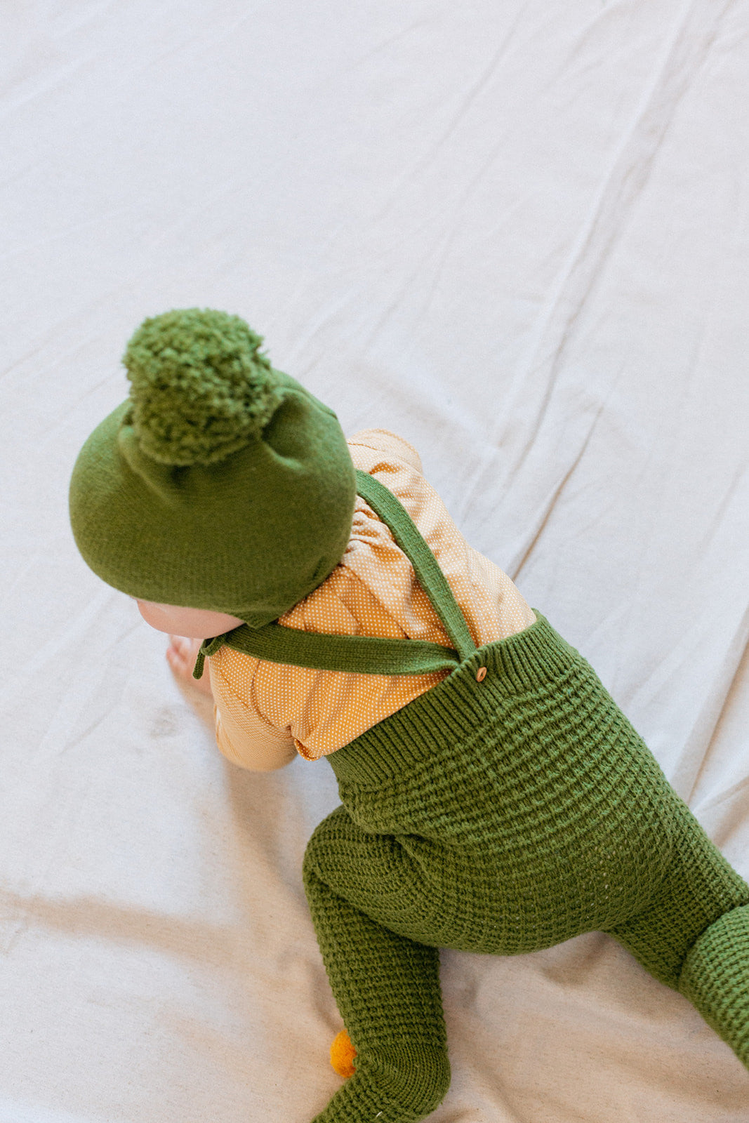 Green pompom gaiter