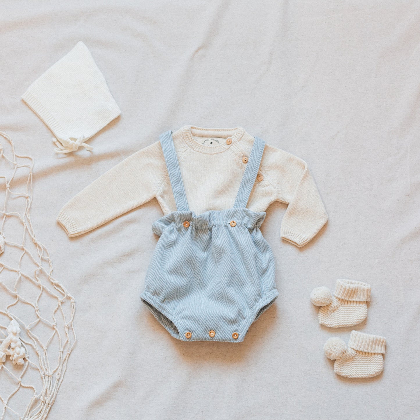 Ivory pompom booties