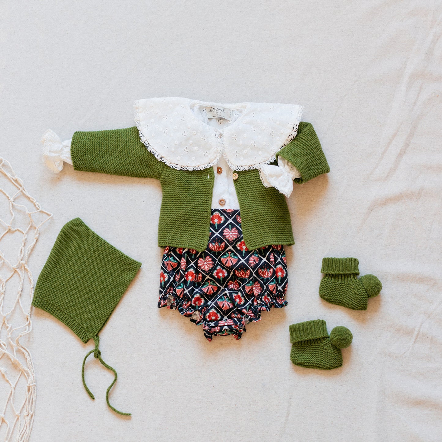 Green pompom booties