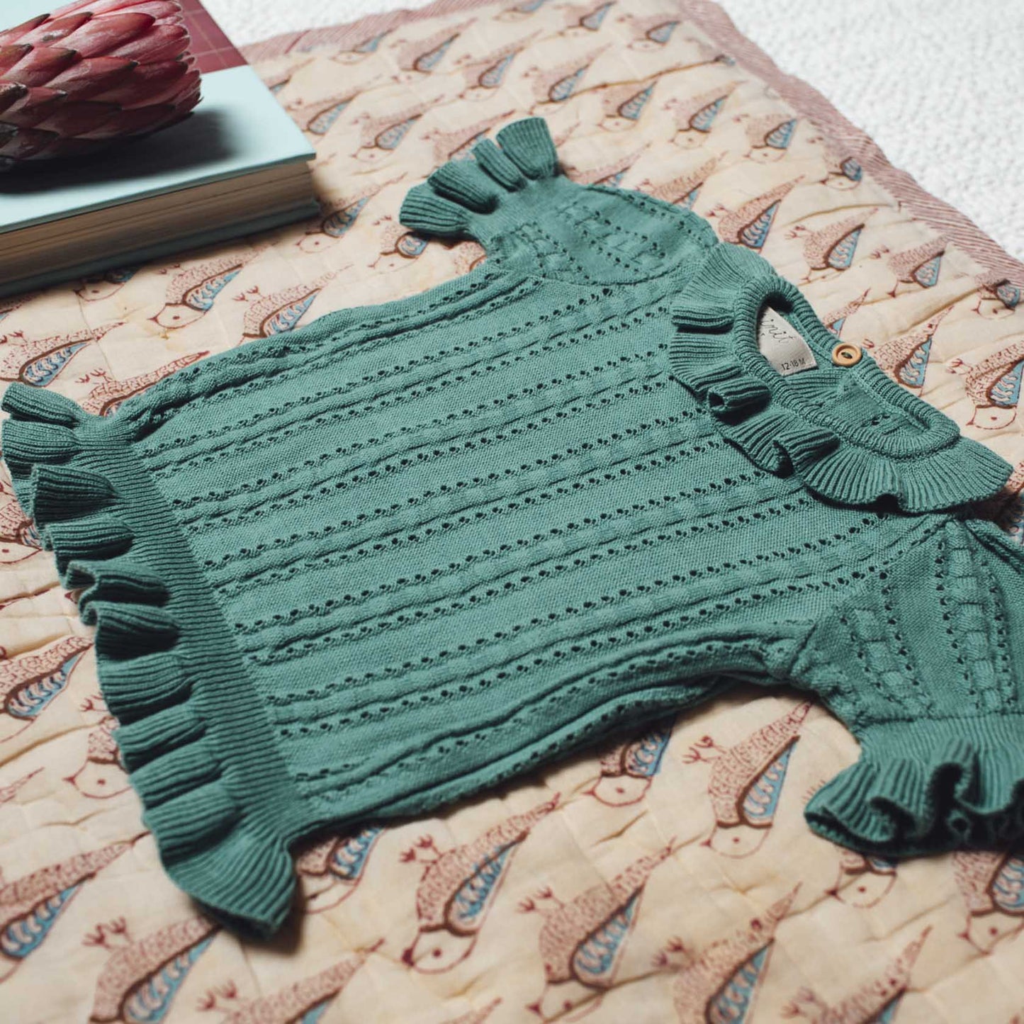 Green openwork sweater