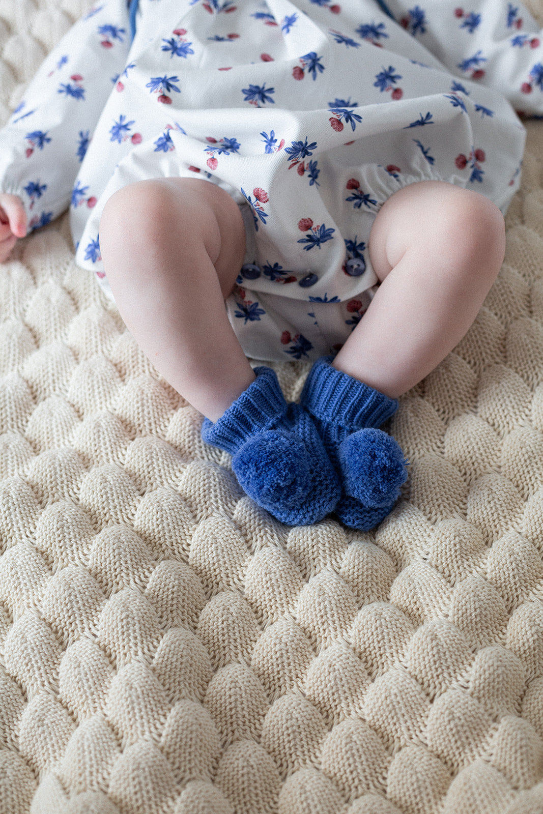 Bluish pompom booties