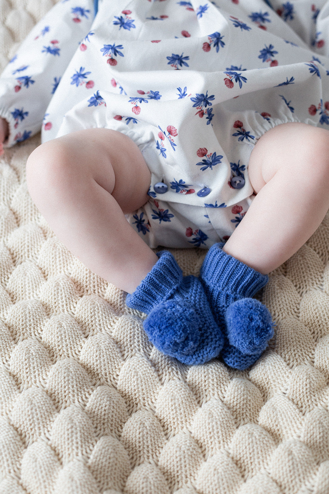 Bluish pompom booties