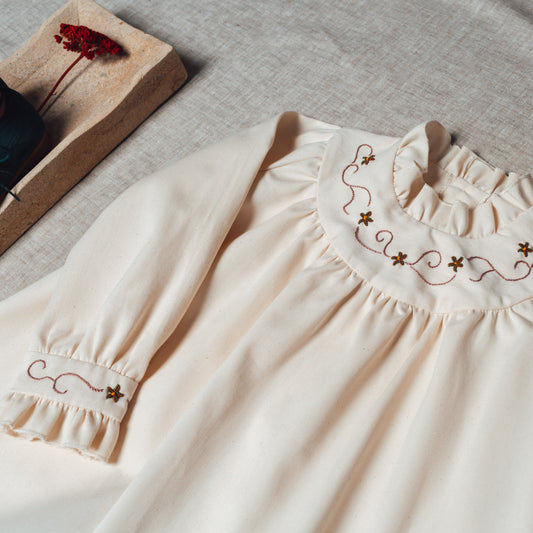 Ivory blouse with embroidered