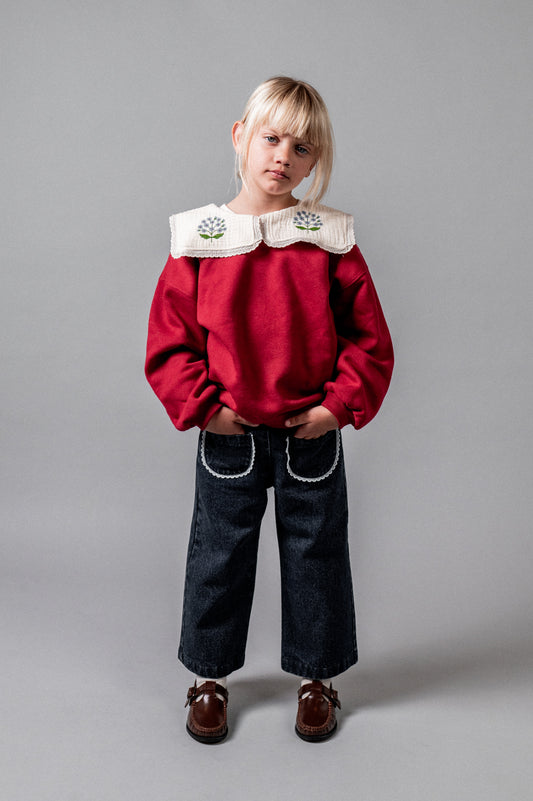 Pantalón largo denim bolsillos puntilla niña