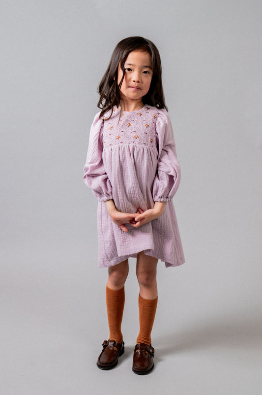 Vestido bordado nidos plumeti malva niña