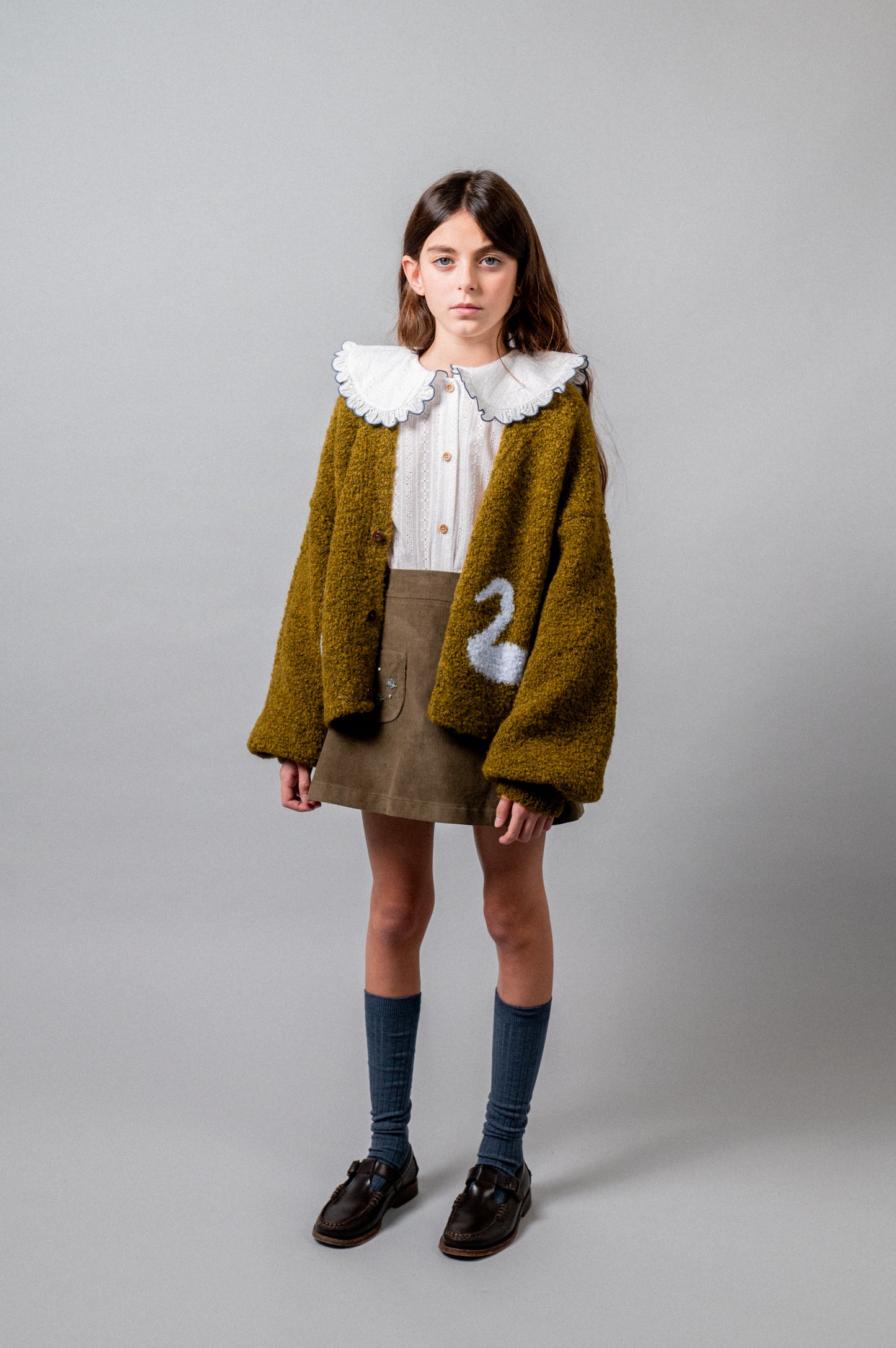 Mini falda bordada pana khaki niña