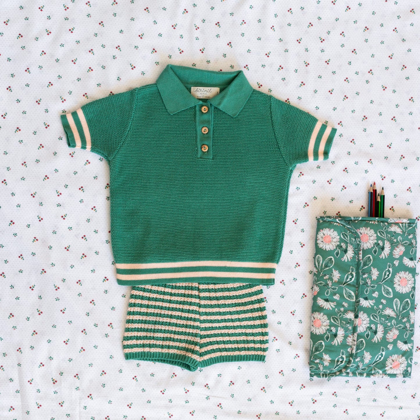 Green and pink polo