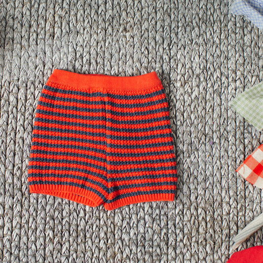 Short coral y marino