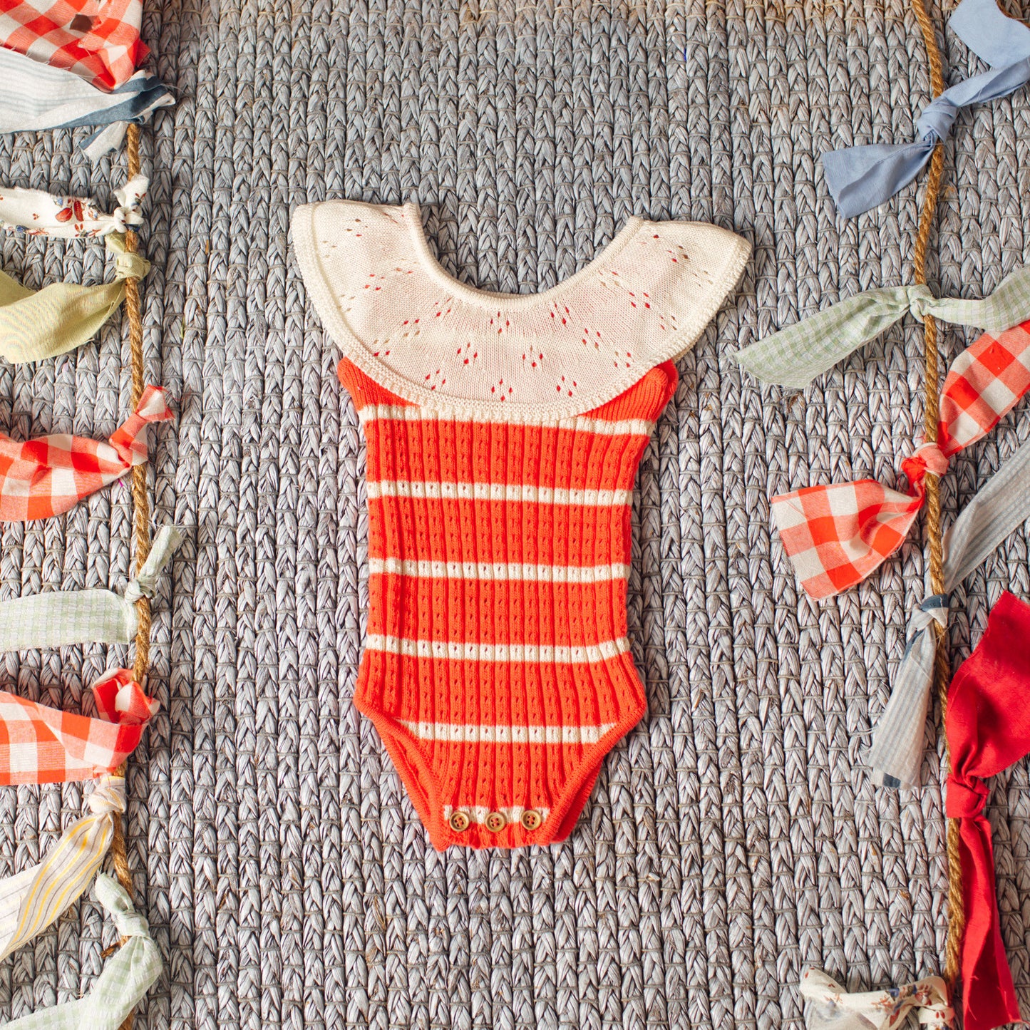 Coral ruffle romper