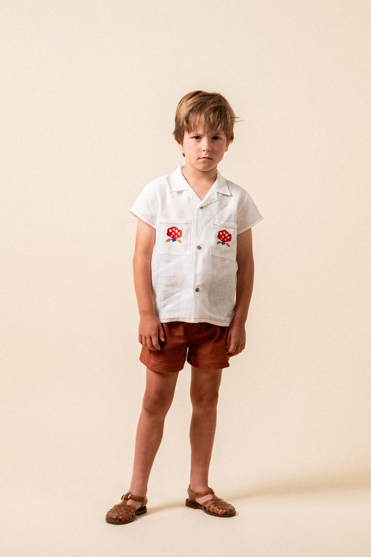 Camisa lino bolsillos bordados niño
