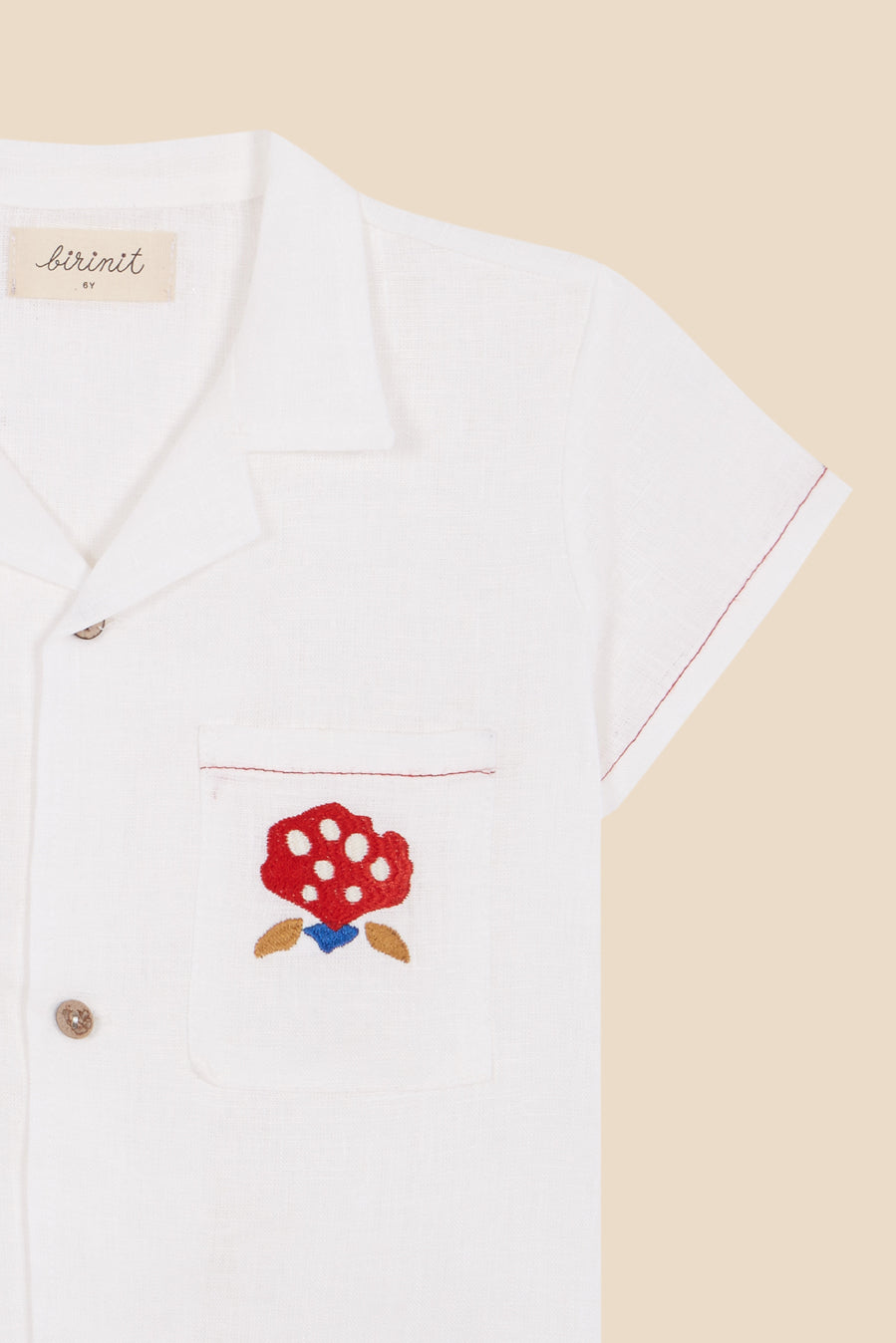 Camisa lino bolsillos bordados niño