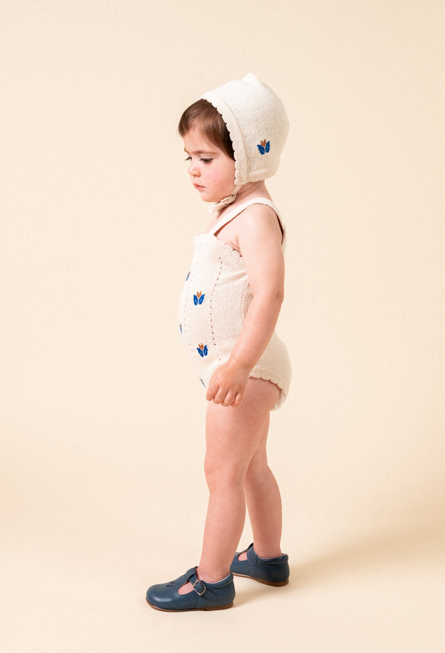 Knit bonnet with floral embroidery baby