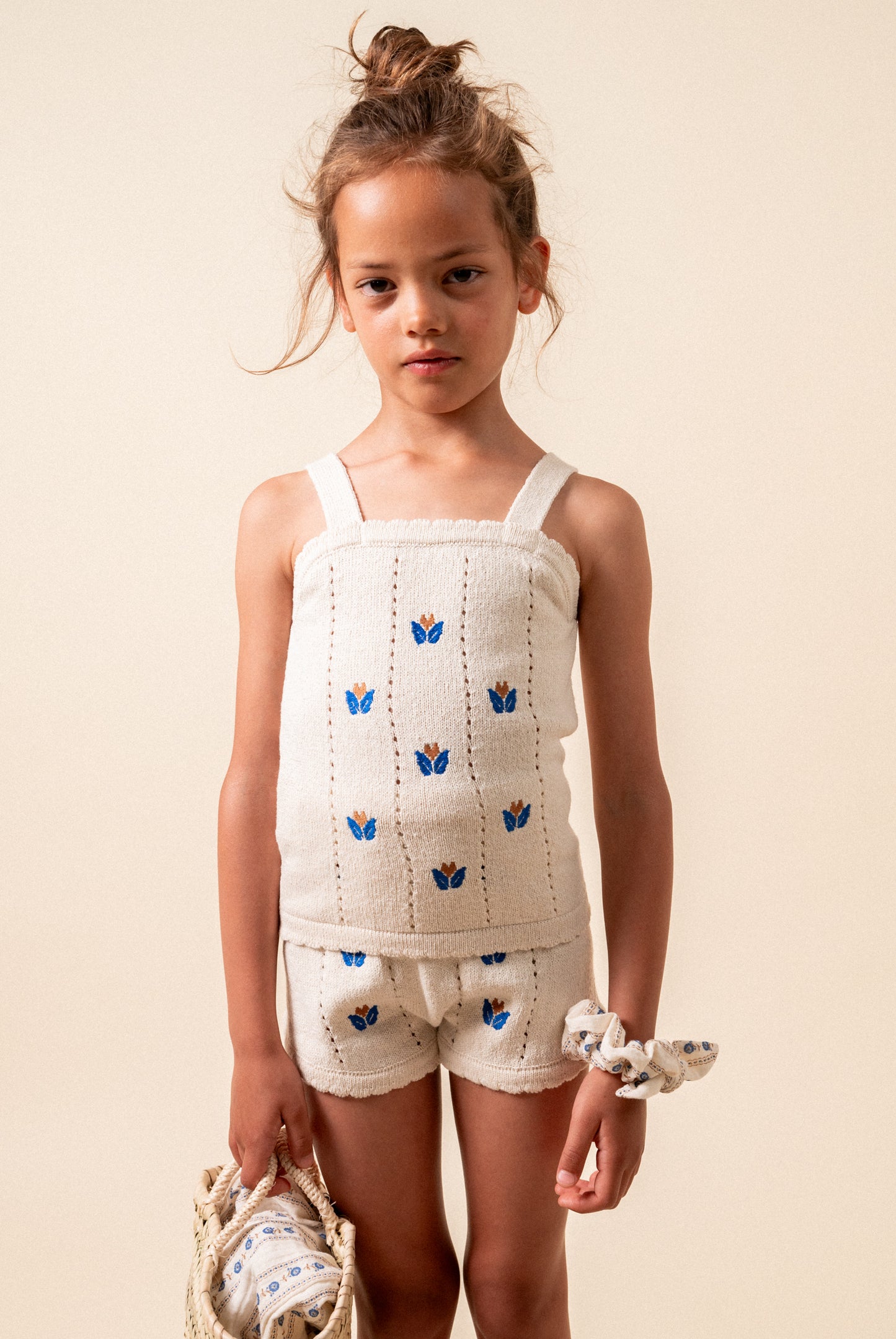 Knit top with floral embroidery girl