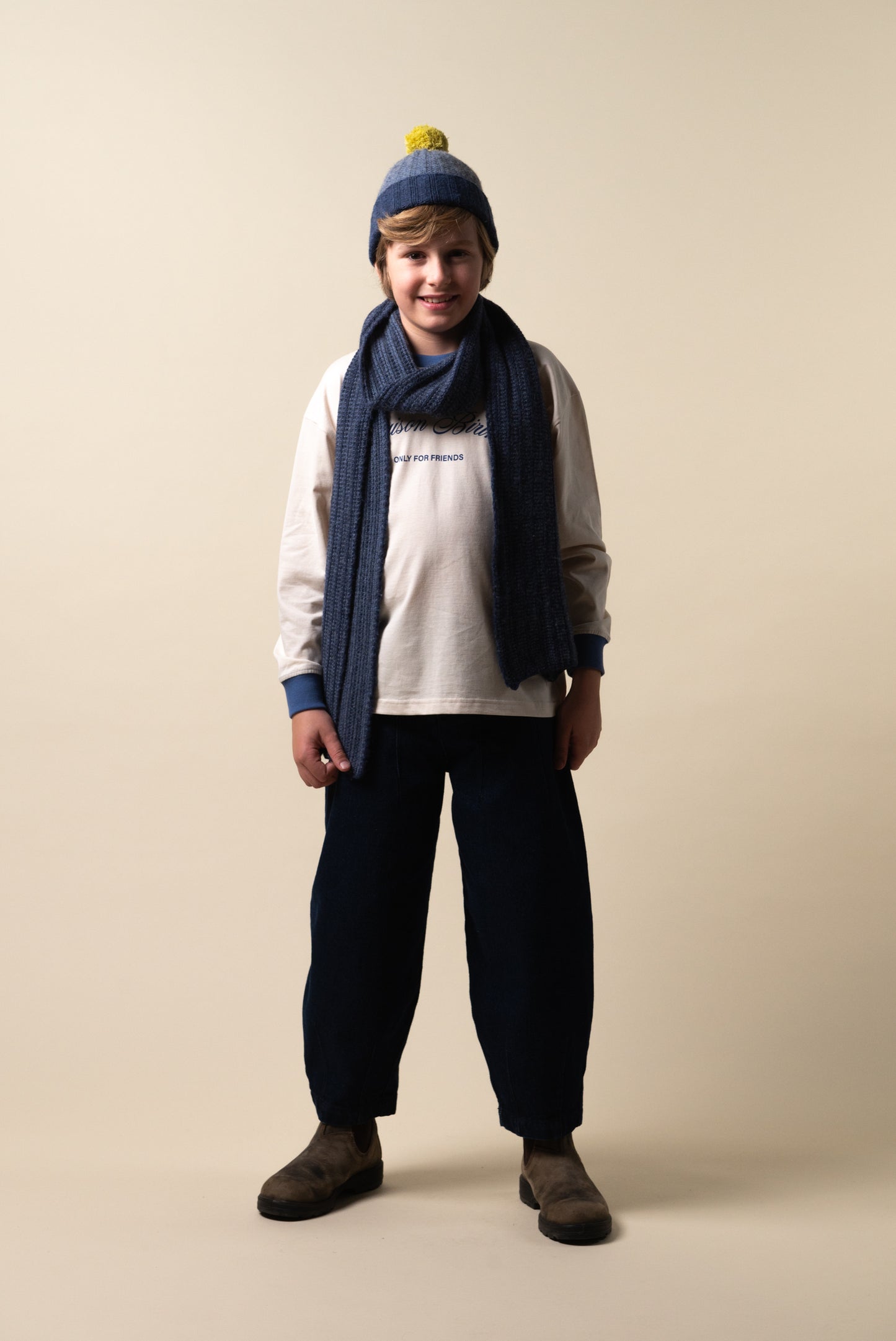 Blue knitted pompom hat