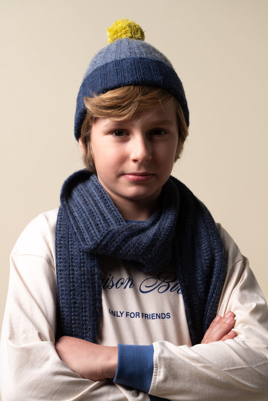 Blue knitted pompom hat