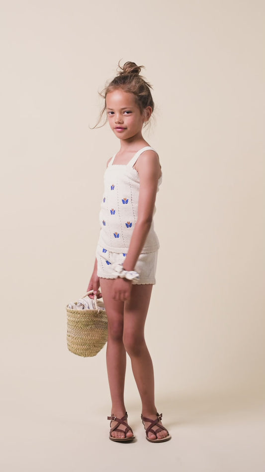 Knit top with floral embroidery girl